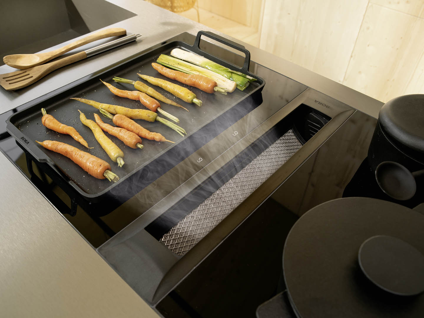 Open kitchen with integrated cooktop